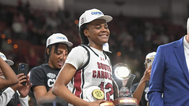 South Carolina guard MiLaysia Fulwiley (12) holds the MVP trophy after South Carolina beat LSU for the SEC Women's Basketball Tournament Championship at the Bon Secours Wellness Arena in Greenville, S.C. Sunday, March 10, 2024.